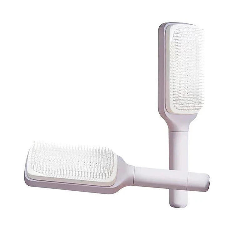 Rotating lifting hair comb