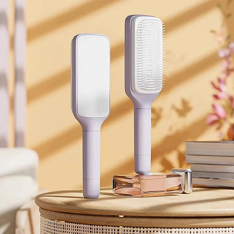 Rotating lifting hair comb